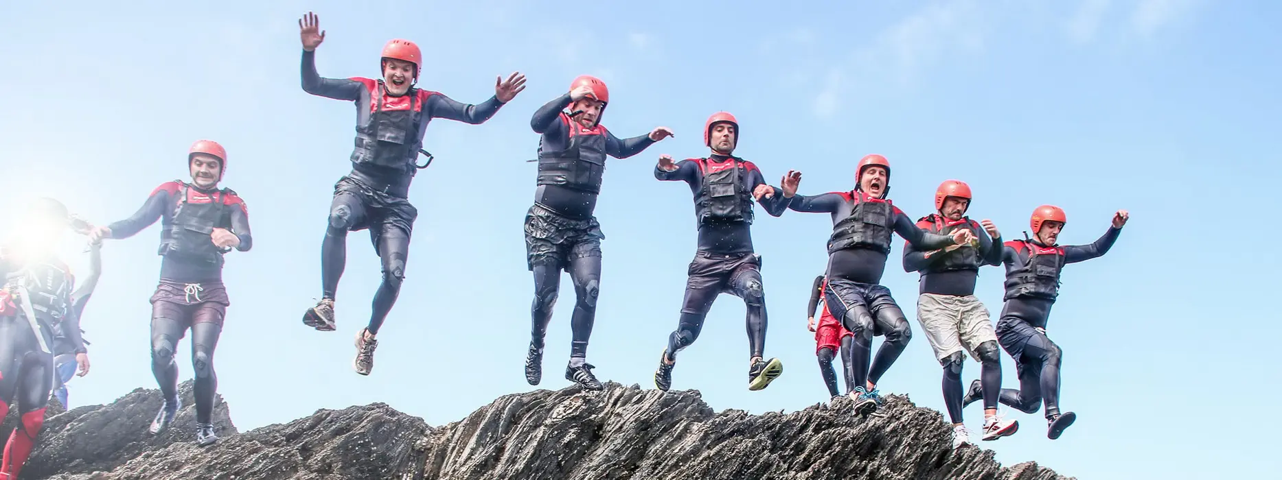 Group coasteering at Croyde Bay on the North Devon coast